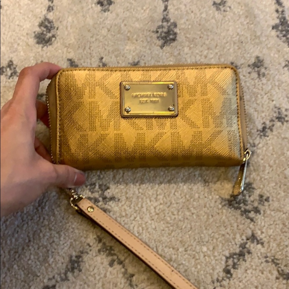 Michael Kors gold wristlet
